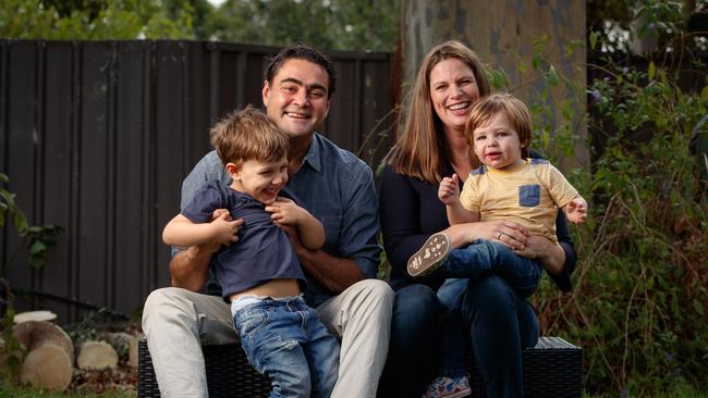 David Penberthy and Kate Ellis with their children Sam, 3, and Charlie, 1 at home in Adelaide. Picture: Matt Turner