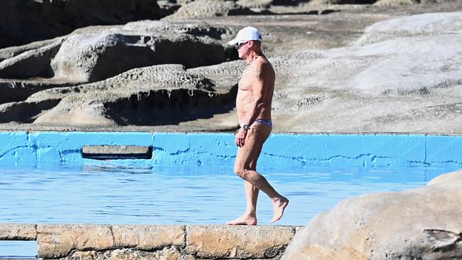 Mike Carlton enjoys the sunny winter weather at Whale Beach last week — thankfully with swimmers on. Picture: Jeremy Piper