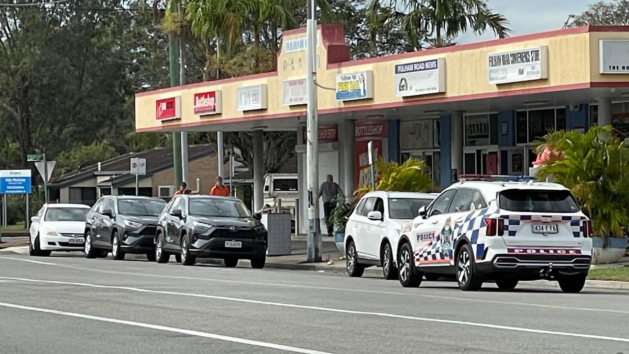 Police are speaking with two people at the scene of an alleged carjacking in Fulham Rd, Gulliver in Townsville on July 6. An armed man is evading police on a return to prison warrant. Picture: Daniel Shirkie