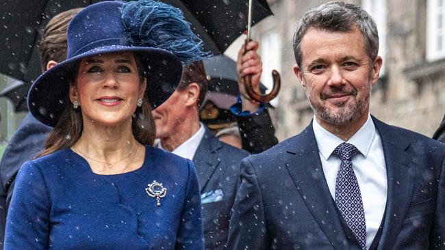 King Frederik X of Denmark (R) and Queen Mary of Denmark (C), followed by Margrethe II of Denmark arrive to attend a session of the Folketing, the Danish parliament, at the Folketingsalen at Christiansborg Palace in Copenhagen, Denmark, on January 15, 2024. It is the first time the royal family visits the Folketing after taking their new official roles. (Photo by Thomas Traasdahl / Ritzau Scanpix / AFP) / Denmark OUT