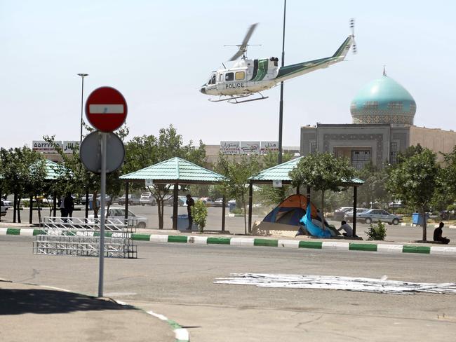 A police helicopter flying around outside the mausoleum of Ayatollah Ruhollah Khomeini in Tehran.  Picture:  AFP