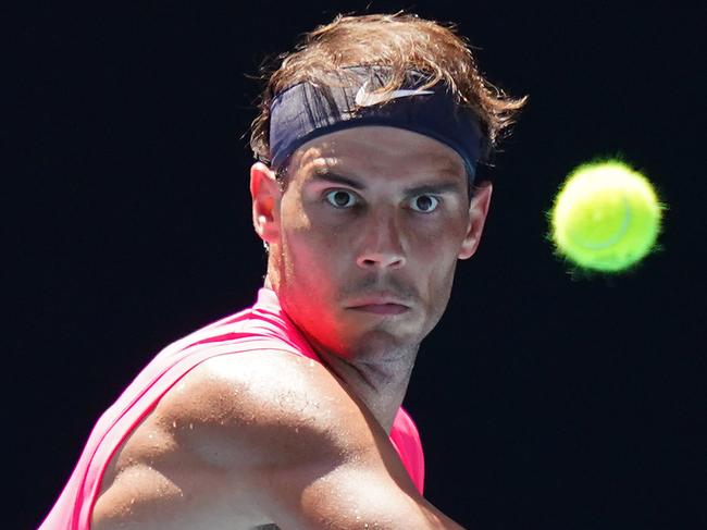 Rafael Nadal of Spain plays a return shot during his first round match against Hugo Dellien of Bolivia on day two of the Australian Open tennis tournament at Rod Laver Arena in Melbourne, Tuesday, January 21, 2020. (AAP Image/Scott Barbour) NO ARCHIVING, EDITORIAL USE ONLY