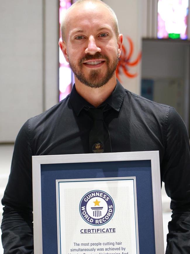 MJ Hair’s Mat with his Guinness World Record certificate. Picture: Supplied