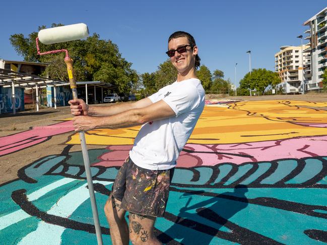 Melbourne artist Kitt Bennett has worked on many large scale murals, he calls his style “illustrative”. Picture: Floss Adams.