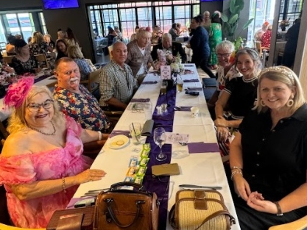 Tina and Jeff Russell, Linda Marzolla, Len Mayfield, and Lou and Rod Cartwright celebrating the Melbourne Cup at Gympie RSL Club.