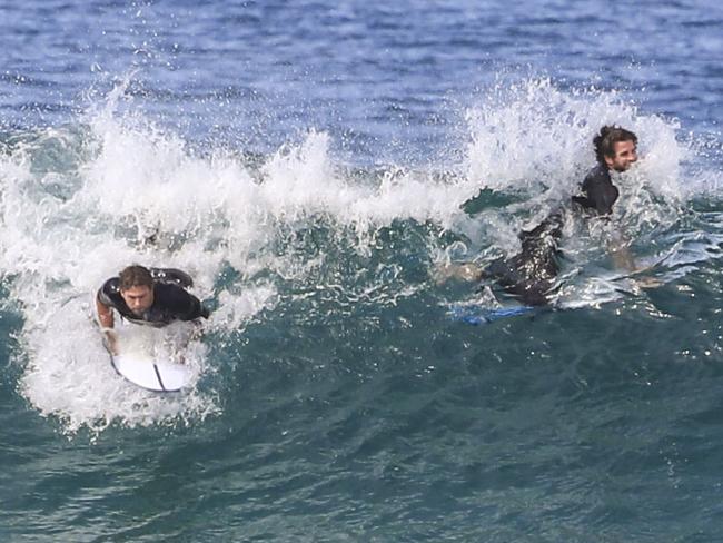 The two brothers tearing up the waves. Picture: Media Mode