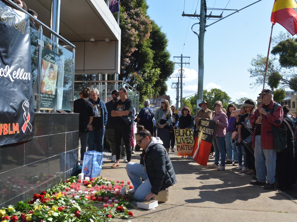 Family and supporters lay flowers ahead of the Coronial Inquest into Steven Lee Nixon-McKellar's death in police custody.