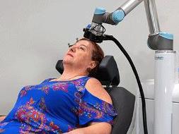 Brain imaging and transcranial magnetic stimulation treatment at the Queensland Neurostimulation Centre. Photo Supplied.