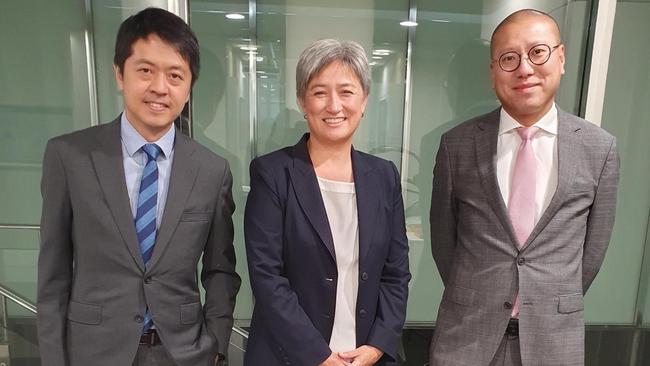 Ted Hui, left, and Kevin Yam with Foreign Minister Penny Wong in January.