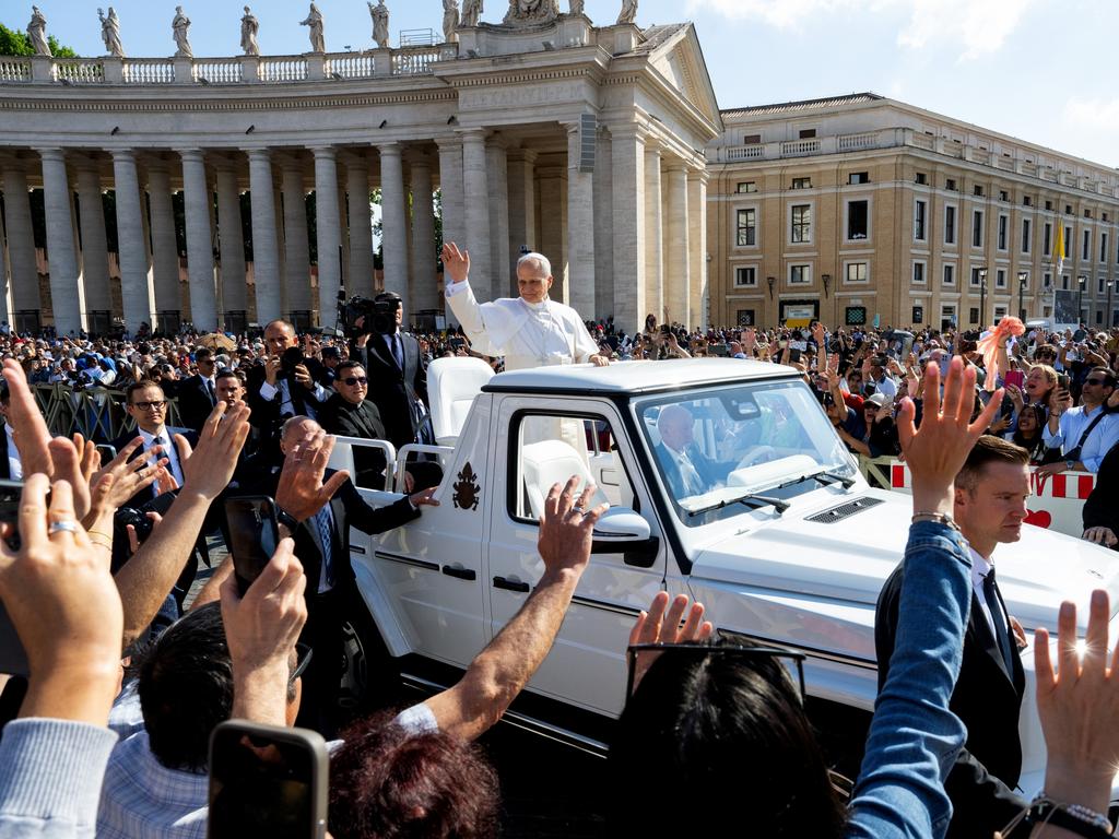 Pope Leo XIV waves as he arrives in the Pope mobile ahead of the Inauguration Mass of Pope Leo XIV in St Peter's Square. Picture: Getty