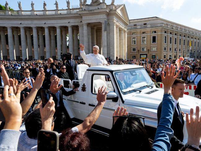 Pope Leo XIV waves as he arrives in the Pope mobile ahead of the Inauguration Mass of Pope Leo XIV in St Peter's Square. Picture: Getty