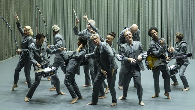 David Byrne, front, centre, with his band in American Utopia
