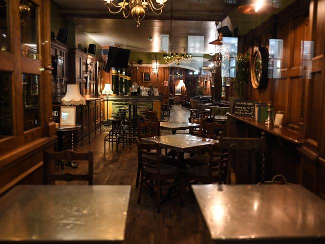 A pub is seen empty in London, United Kingdom. British Prime Minister Boris Johnson announced tougher restrictions. Picture: Peter Summers/Getty Images)