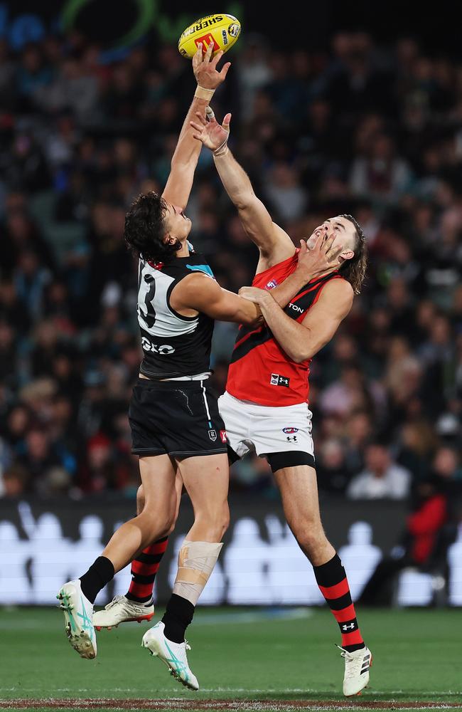 Ivan Soldo and Sam Draper go head-to-head during Gather Round. Picture: James Elsby/AFL Photos