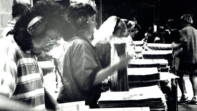 Inserters working on the Bulletin before it was shipped to the public. Picture: Michael Ross.