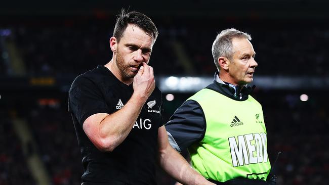 Ben Smith of the All Blacks walks off for a concussion test at Eden Park.