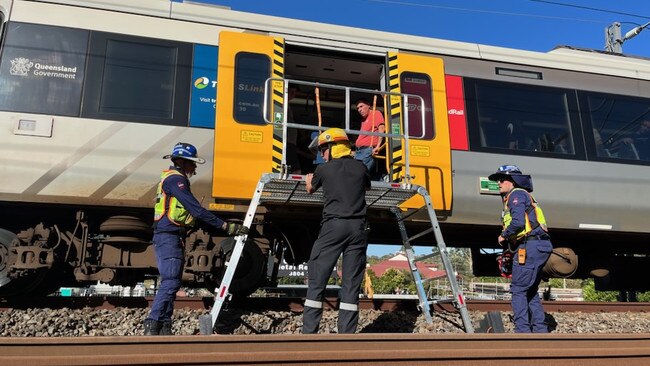 Emergency services on the scene after a train got stuck on the line near Yatala. Picture: QAS.