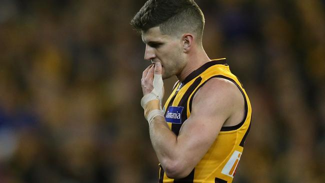 What might have been: Luke Breust reacts to missing an easy set shot to put the Hawks five goals up in the second quarter. Picture: Wayne Ludbey