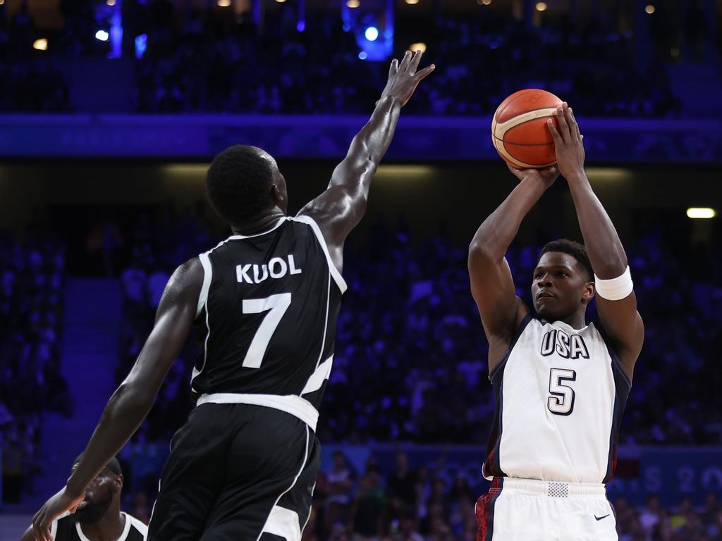 Bul Kuol playing for South Sudan reaches out to block Anthony Edwards of the USA at the Paris Olympics. Picture: Getty