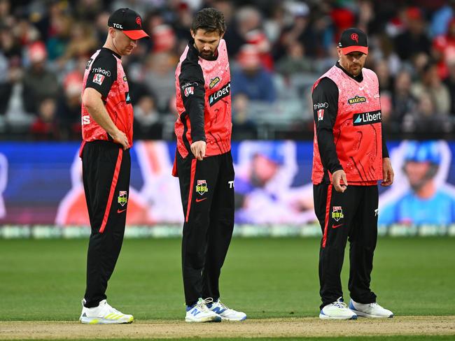 Renegades players look at the pitch. (Photo by Quinn Rooney/Getty Images)