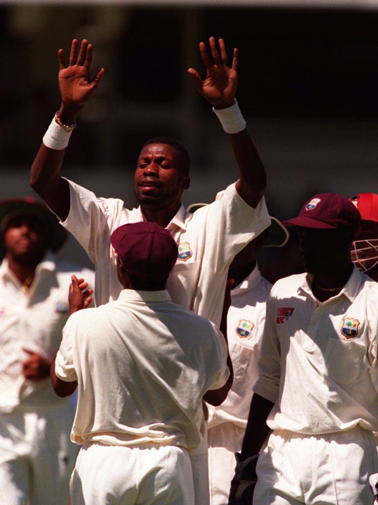 Ambrose celebrates the wicket of Hayden in Perth in 1997.