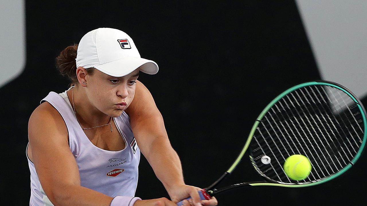 ADELAIDE, AUSTRALIA - FEBRUARY 24: Ashleigh Barty of Australia plays a shot against Danielle Collins of the USA during day three of the Adelaide International WTA 500 at Memorial Drive on February 24, 2021 in Adelaide, Australia. (Photo by Sarah Reed/Getty Images)