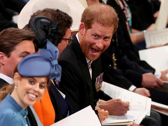 Britain's Prince Harry (C), Duke of Sussex, grimaces as he waits for the start of the National Service of Thanksgiving for The Queen's reign at Saint Paul's Cathedral. Picture: AFP