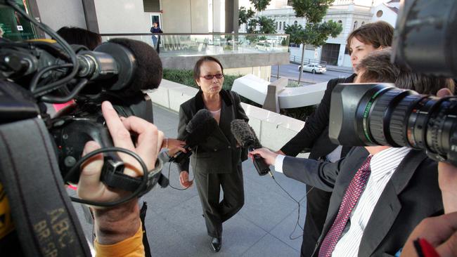 Geraldine Fooi Fong Robertson and media outside a court where the RSPCA was prosecuting her in 2008.