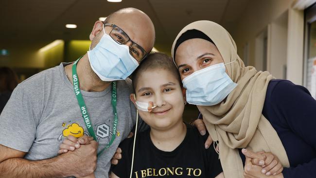 New Royal ChildrenÃ&#149;s Hospital Car-T Cell Therapy stopping cancer. Raya Eloshaiker 11, recovering well after a bone marrow transplant and Car-T cell therapy. Raya with her parents Nader and Hanaa in the RCH ward. Picture: David Caird