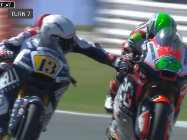 Moto2: Romano Fenati grabs the brake lever of rival Stefano Manzi mid-race.