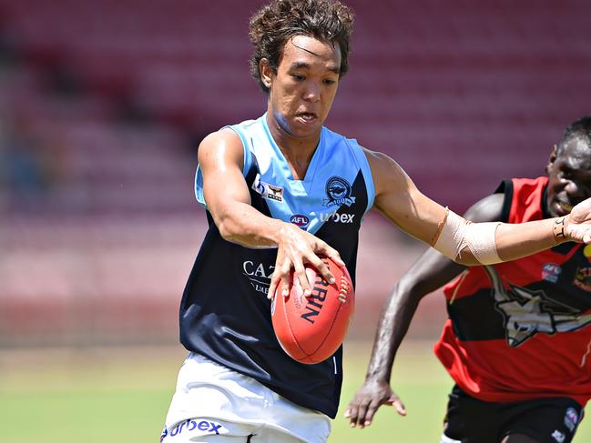 NTFL Premier League - Tiwi Bombers V Darwin Buffaloes - Buffs player Michael Hagan and Bombers player Jerome Tipuamantamirri.