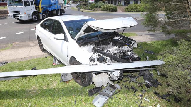 A car crashed beside childcare centre at the 19th Ave and Saffron St roundabout in Elanora. Picture: Richard Gosling.