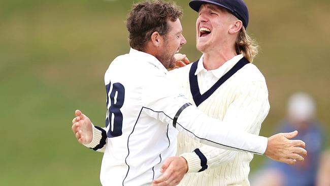 Jon Holland (left) celebrates a wicket. Picture: Mark Kolbe/Getty Images