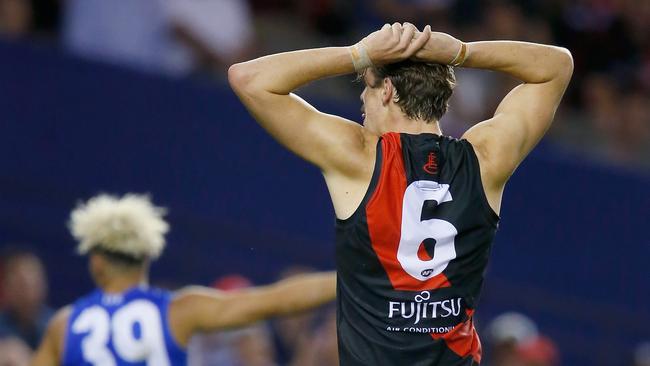 Joe Daniher’s attempted handball to Josh Green was costly. Pic: Getty Images