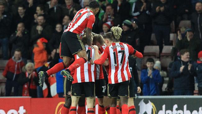 Sunderland players celebrate after a goal.