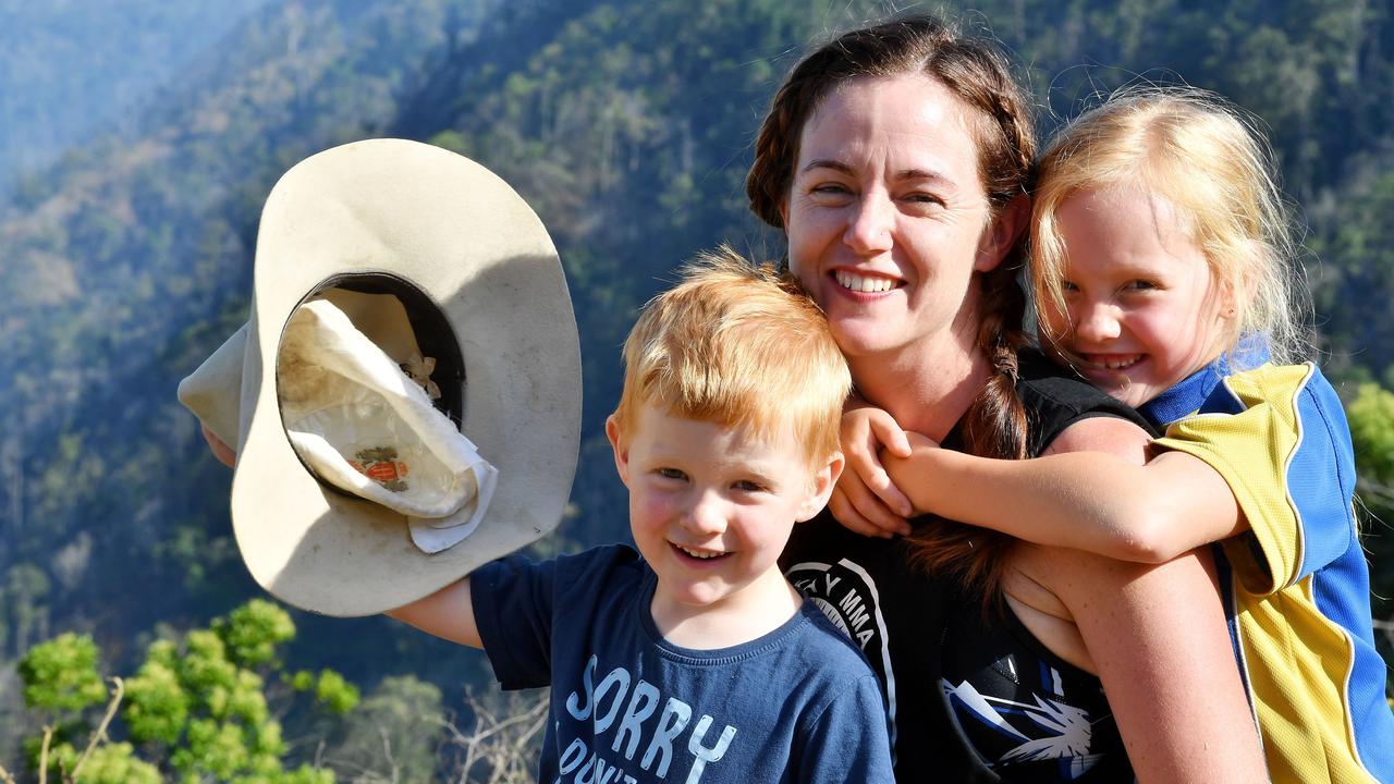 Eungella resident Jolene Robinson with Skye Robinson, 7, and Ryder Robinson,4, one year on from the Eungella bush fires. Picture: Tony Martin