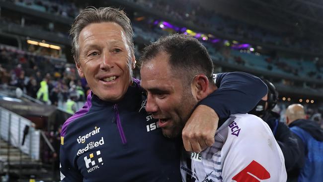 Craig Bellamy and Cameron Smith celebrate the Storm’s 2020 Grand Final win.