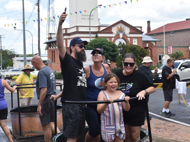 This family from Brisbane wont forget a moment at the Apple and Grape Festival grape crush, March 1, 2024