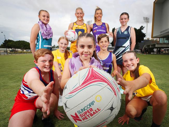 Junior netballers from left, Beau Meyers, Taylor Kolus, Kasey Simmons, Paige Kolus, Hudson Taylor, Zoe Peters, Logan Love, with Annie Miller from Sunshine Coast Lightning and Lara Dunkley from Firebirds. Picture Glenn Hampson