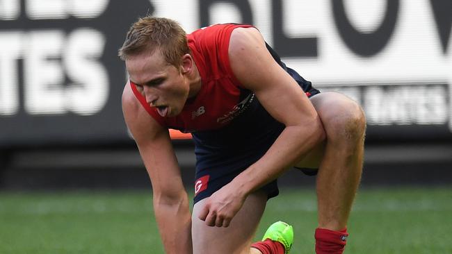 Bernie Vince after Ben Cunnington punched him in the stomach at the MCG on Sunday. Picture: AAP