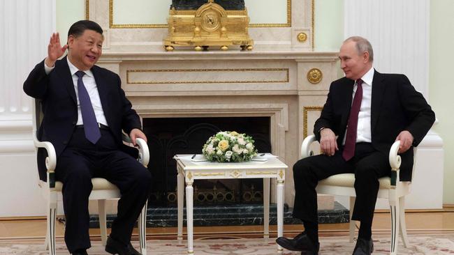 Xi Jinping will do anything it takes to keep Vladimir Putin going. Picture: AFP.