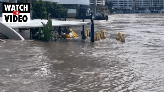 Eagle St in Brisbane's CBD has been smashed by flood waters