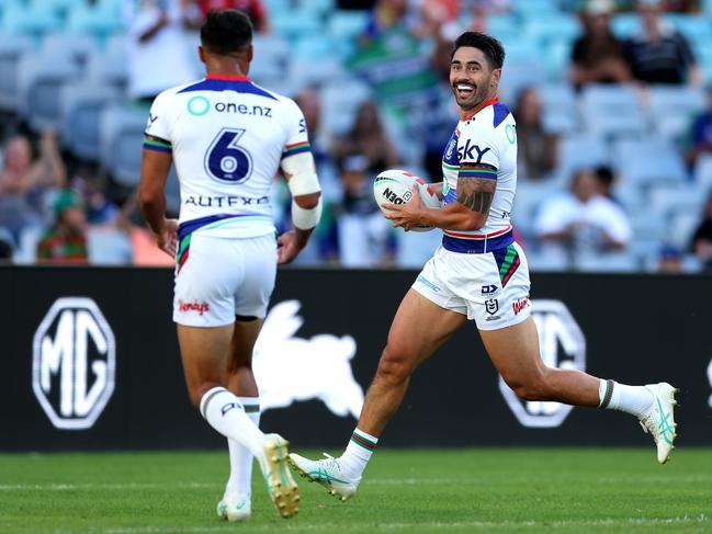 SYDNEY, AUSTRALIA - APRIL 06: Shaun Johnson of the Warriors celebrates his try with Te Maire Martin during the round five NRL match between South Sydney Rabbitohs and New Zealand Warriors at Accor Stadium, on April 06, 2024, in Sydney, Australia. (Photo by Mark Metcalfe/Getty Images)