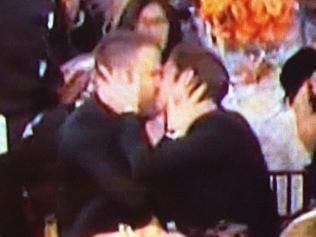 Ryan Reynolds and Andrew Garfield kiss inside the 2017 Golden Globes. Picture: Supplied