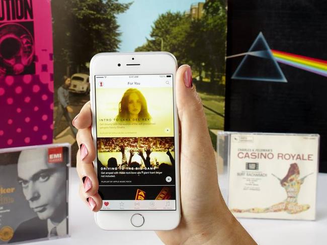 Can Apple Music, available for iPhones and computers today, make song streaming the successor to records, CDs and MP3s? PHOTO: F. MARTIN RAMIN/THE WALL STREET JOURNAL, STYLING BY ANNE CARDENAS