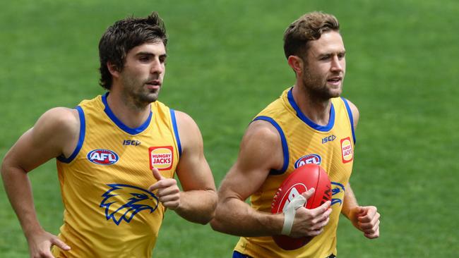 Gaff (left), seen here training with teammate Mark Hutchings, is still getting plenty of love from fans. Pic: AAP