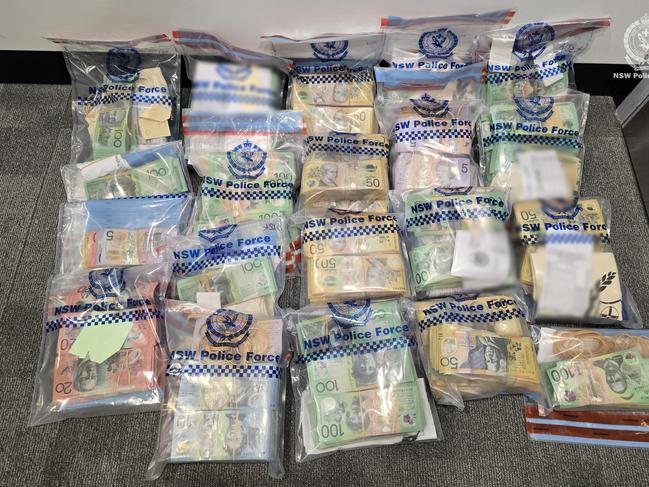 Sam Collison Stretton, 26, was charged with deal with proceeds of crime after Raptor Squad police seized $833,025 cash from his Booker Bay home, which they allege was for the importation and supply of illegal tobacco and vapes. Picture: NSW Police