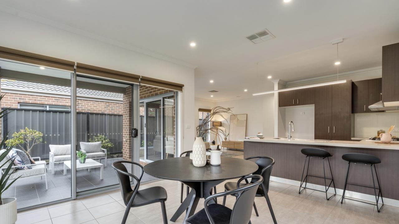 With crisp cabinetry and modern finishes, the kitchen is the heart of this first homebuyer’s dream.