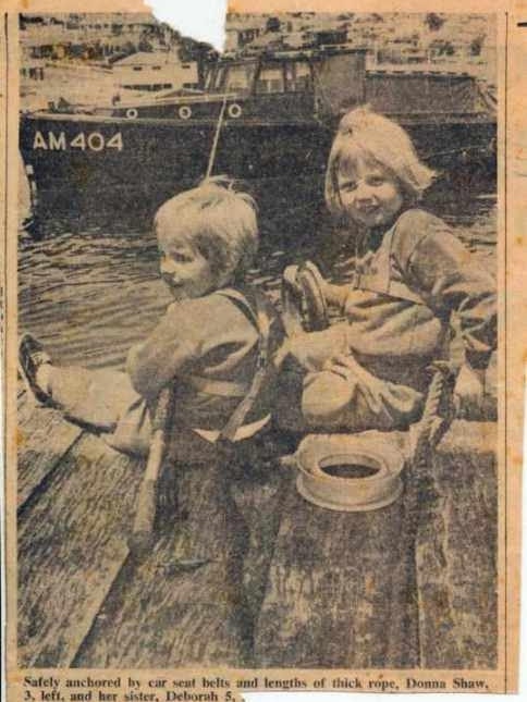 From the archives: Danna Shaw, 3, and her sister Deborah, 5, fishing off the Watsons Bay wharf.