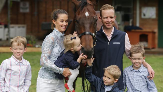 Kerrin McEvoy with wife Cathy0 and children Charlie, Eva, Rhys and Jake with Redzel at Peter Snowden's Randwick stables after going back to back in this year’s The Everest at Royal Randwick Racecourse. Picture: Mark Evans/Getty Images